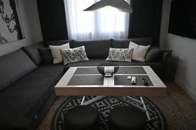 a living room with a couch and a coffee table at Athenian Stay 303 Apartment in Athens