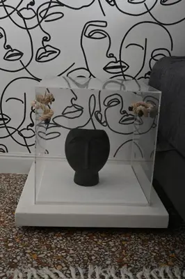 a black vase in a glass display case at Athenian Stay 303 Apartment in Athens