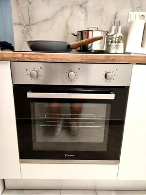 a kitchen oven with a pan on top of it at Athenian Stay Chara's Apartment in Athens