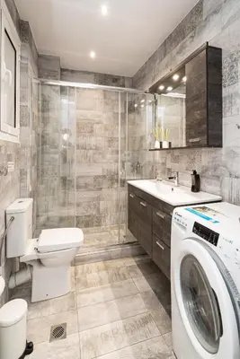 a bathroom with a washer and dryer in it at Athens Casa All Acropolis in Athens