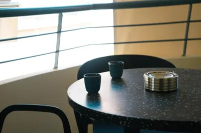 a black table with two cups on top of it at Premium Stay at a Stunning Residence in Athens