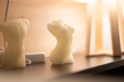 a pair of white statues sitting on a table at Modern Rooms Exarchia in Athens