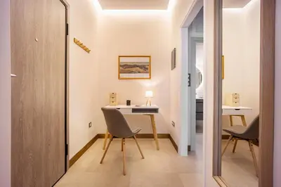 a small dining room with a table and two chairs at Philon's City Retreat - Near Athens Center in Athens