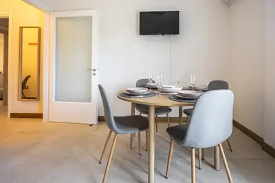 a dining room with a table and chairs at Philon's City Retreat - Near Athens Center in Athens
