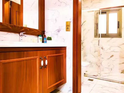 a bathroom with a sink and a shower and a toilet at Oulang Cozy Apartment Athens- Acropolis View Haven in Athens