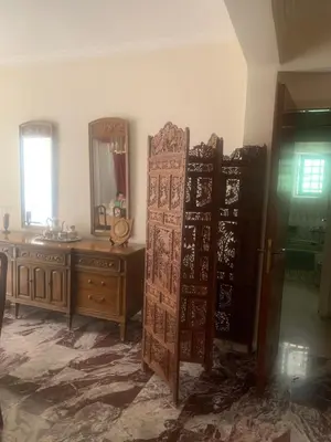 a room with two doors and a sink and a mirror at Παλαιό Φάληρο Αθηναϊκή Ριβιέρα in Athens