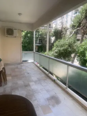 an empty balcony with a large window in a building at Παλαιό Φάληρο Αθηναϊκή Ριβιέρα in Athens