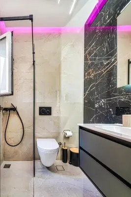 a bathroom with a shower and a toilet and a sink at Melina's Apartment Neo Psychiko in Athens