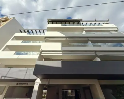 a white building with a lot of windows at Airrent Apartments 2 Designer Stay Free Parking Quiet Central in Athens