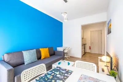 a living room with a couch and a table at Kallari Serenity Apartment in Athens