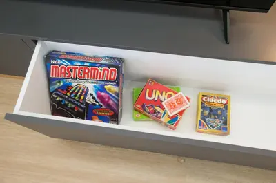 a shelf with some candy and other snacks on it at K11 Apartment in Athens