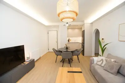 a living room with a couch and a table at K11 Apartment in Athens