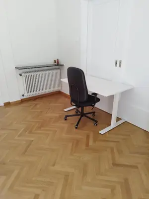 an office with a white desk and a black chair at Berry room 2 in Athens