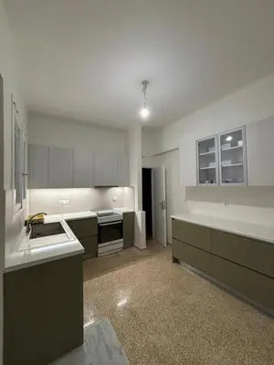 a large kitchen with a sink and a stove at Berry room 5 in Athens