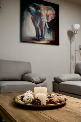 a plate of food on a table in a living room at African Adventure Apartment in Piraeus