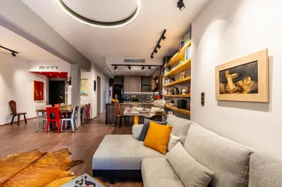 a living room with a couch and a table at The Architect s Loft in Athens