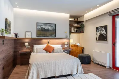 a bedroom with a large bed in a room at The Architect s Loft in Athens