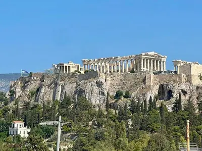 a view of the acropolis of athens from atop a mountain at Bright and stylish Acropolis studio in Athens
