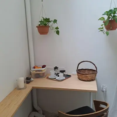 a wooden table with two cups and a basket on it at Skipper's Urban Endeavor One bed lux central quiet smart cozy apart Athens in Athens