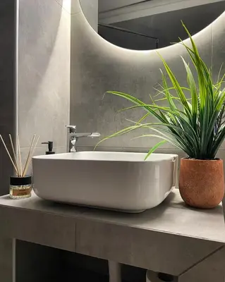 a bathroom sink with a plant on a counter at Dear Athens Suite in Athens