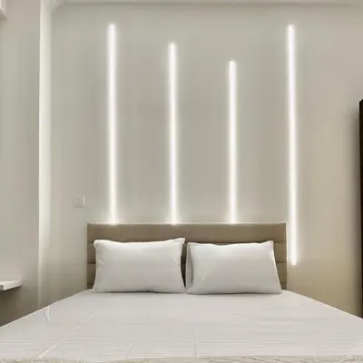 a bed with two white pillows in a room at Dear Athens Suite in Athens
