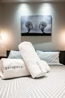 a bedroom with two white pillows on a bed at Wooden Style Apartment in Piraeus in Piraeus