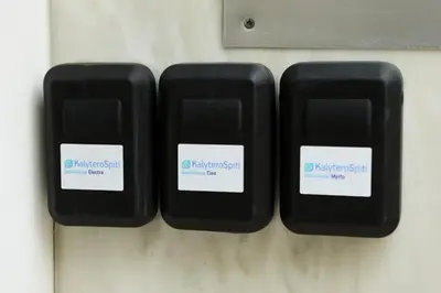 two black computer keyboards with labels on them at Best House Myrto Pasalimani Piraeus in Piraeus