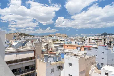 a view of a city from a building at Bright 1-Bedroom Apartment by WeHost Athens in Athens