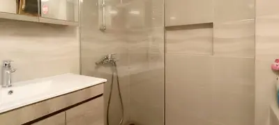 a bathroom with a shower and a sink at Down Town Flat Apartment in Athens