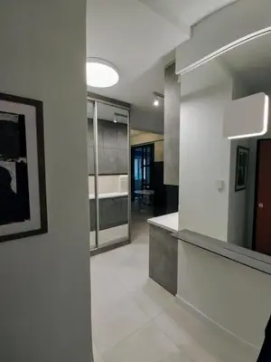 a kitchen with white walls and a counter top at AMG Superior Central Apartment sleeps up to 5 in Athens