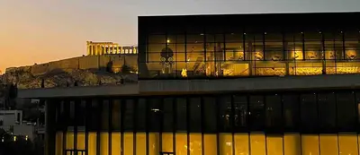 a large building with a view of the acropolis at Acropolis Touch 7th Wonder View DG in Athens