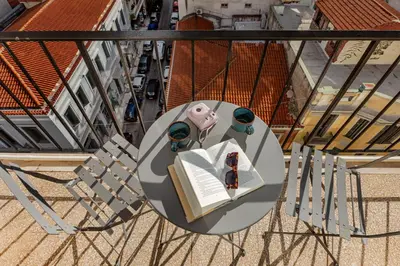 an overhead view of a table with a book and a pig at The Square Hotel by X&N in Athens