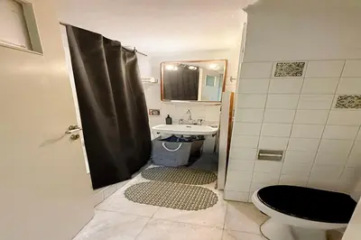 a bathroom with a toilet and a sink at La Boheme stylish Flat i in Athens