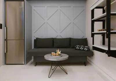 a living room with a couch and a table at Viorelia's Home in Athens