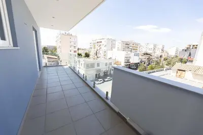 a balcony with a view of a city at Modern Apartment in Piraeus Port D2 in Piraeus
