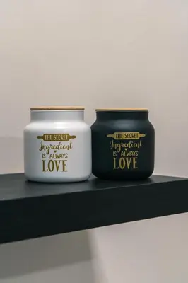 two candles sitting on top of a shelf at Urban Nest in Trendy Koukaki in Athens