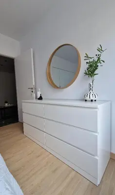a white dresser with a mirror on the wall at Cozy apartment in Athens in Athens