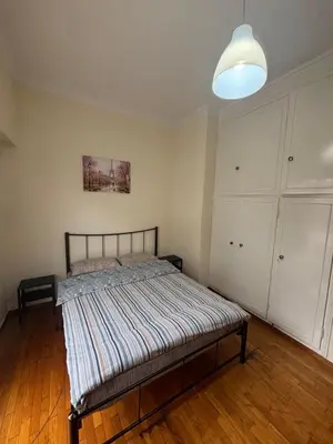 a bedroom with a bed in a room at Dream room 3-4 in Athens