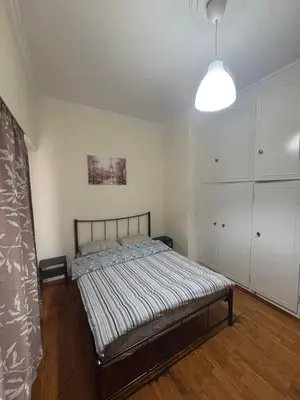 a bedroom with a bed in a room at Dream room 3-4 in Athens