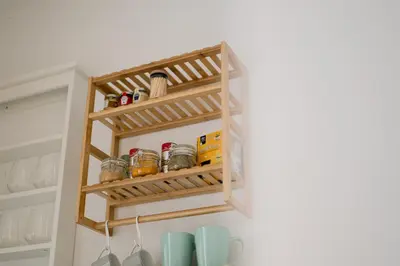 a kitchen shelf with food items in it at MrK Rooftop 2 in Athens