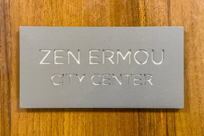 a sign that says zen emu city center at Zen Ermou City Center 2 in Athens