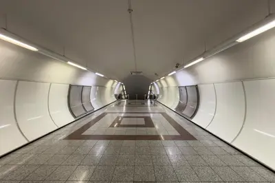 a hallway of an airport with a long aisle at Zen Ermou City Center 2 in Athens