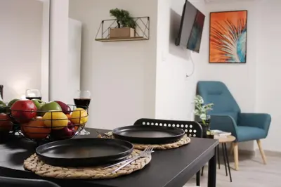 a dining room table with two pans on top of it at ARIS- King suite on the boulevard in Athens