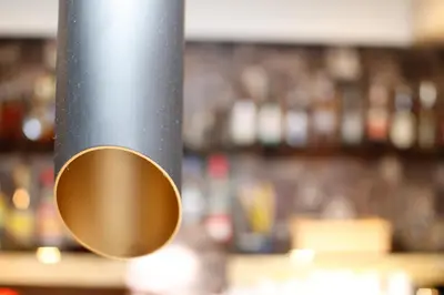 a black pole with a gold circle on it at Athens Choice Hotel in Athens