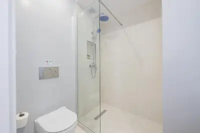 a bathroom with a shower and a toilet at Centric Romantic Studio Zen Clio, Tessera Urban Apartments in Athens
