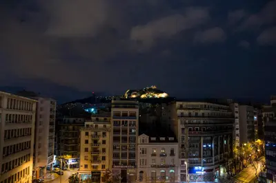 a view of a city at night at Lycabettus View 2, brand-new, central, cozy studio in Athens