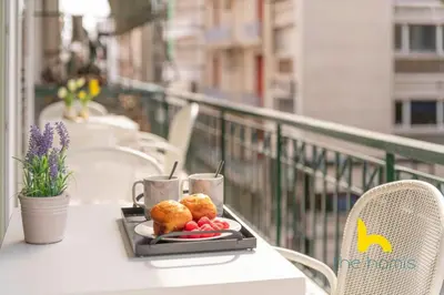 a tray of food on a table on a balcony at Radiant 3BR in Pireas Near Marina Zeas and Metro in Piraeus