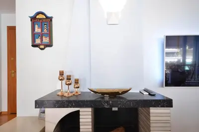 a marble counter with a bowl on it in a room at Piraeus Pasalimani LargeTerrace Seaview Apartment in Piraeus