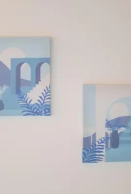 two paintings of a city and a window at Combination of the sea and the countryside in Vari
