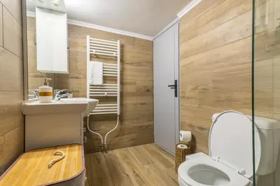 a bathroom with a toilet and a sink at Kallithea fresh in Athens